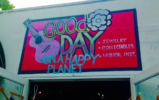 Good Day on a Happy Planet Outside Sign at the Key West Historic Seaport