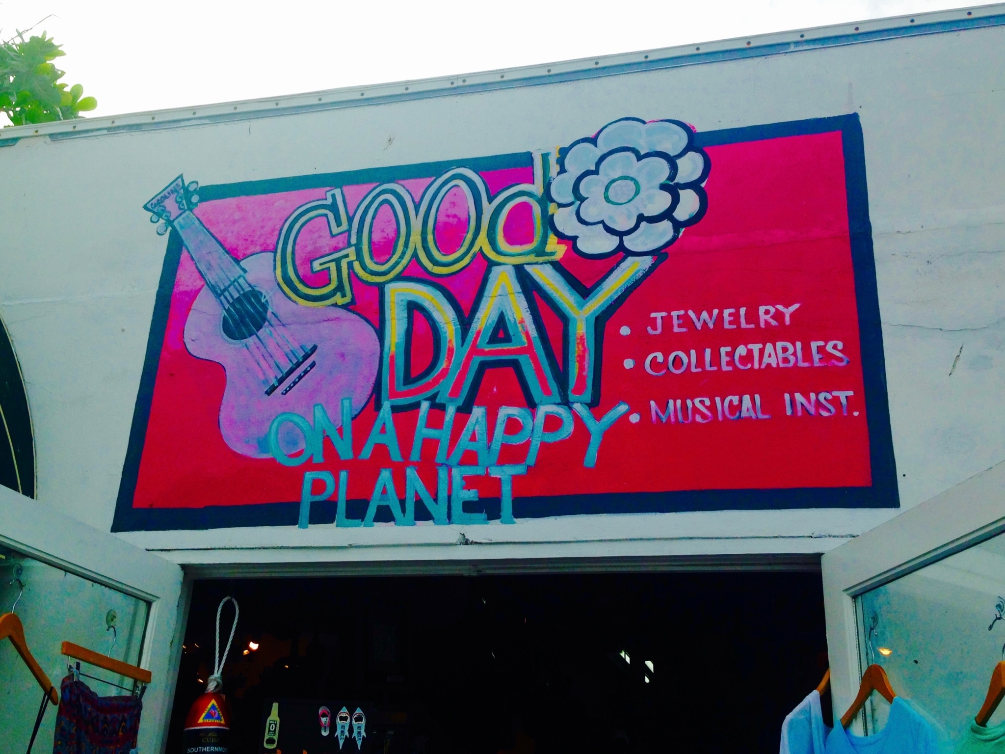 Good Day on a Happy Planet Outside Sign at the Key West Historic Seaport