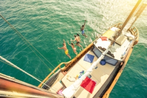 Friends Jumping Off a Boat Header Image