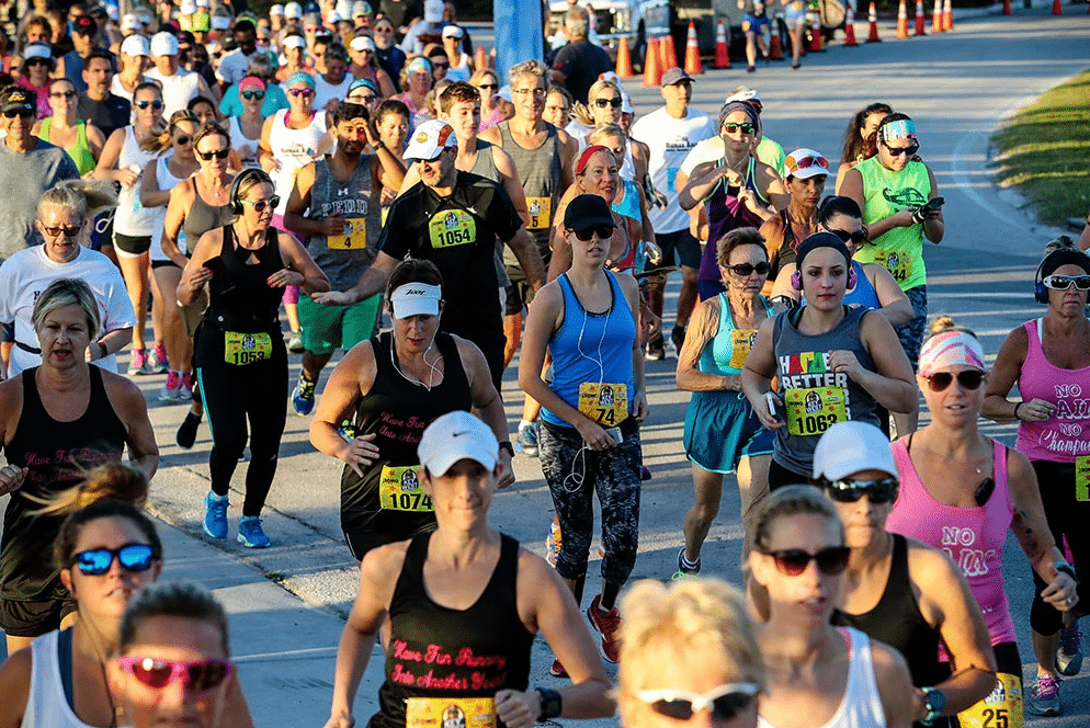 Group of people running at the Southermost Marathon in Key West.