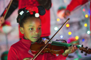 Little Girl playing the violin at the Historic Seaport