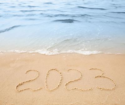 2023 written into the sand at the beach