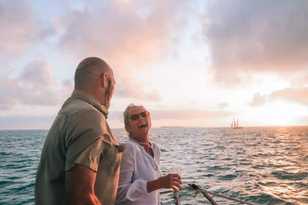 a couple laughing on an argo navis sunset sail